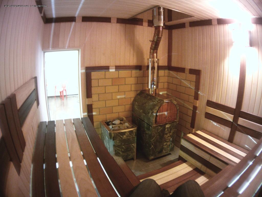 Печь дровяная чугунная Калита с тоннелем, в облицовке арочная (змеевик)